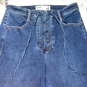 Lace up high rise skinny jeans